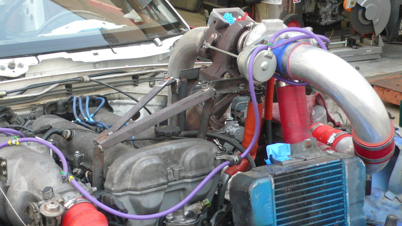 Illustration for article titled Eyesore Racing's Ghettocharged Miata Fears No Turbocharged Peugeot Surrender Monkeys!